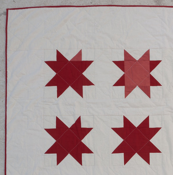 Red Sawtooth Star Quilt